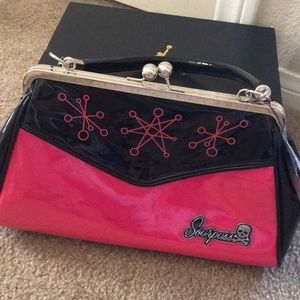 Sourpuss purse